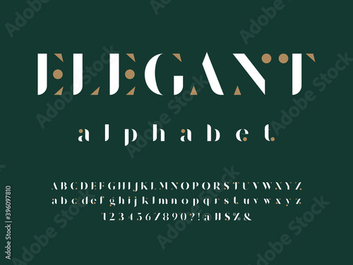 Modern serif alphabet design with uppercase, lowercase, numbers and symbol
