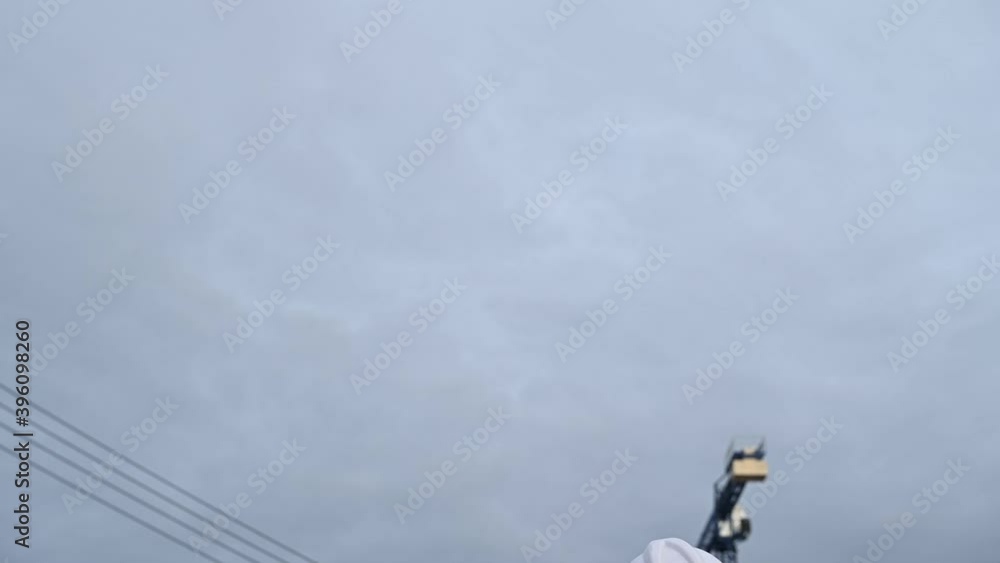 Asian engineer working at site of a large building project,Thailand people,Work overtime at construction site Asian engineer working at site of a large building project,Thailand people,Work overtime at construction site