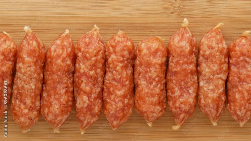 Smoked sausages on the board. Smoked sausages on the board.