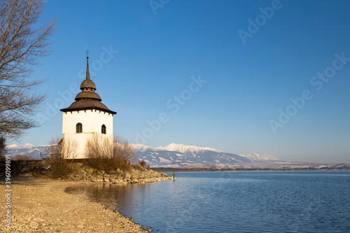 Church of Virgin Mary in Havranok and lake Liptovska Mara, district Liptovsky...