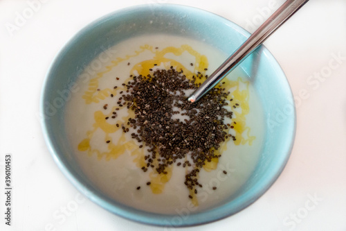 a breakfast bowl of yogurt with chia and honey 