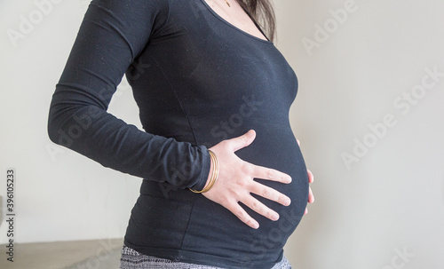 Pregnant woman, family, love and life concepts. Horizontal wide photo with copy space.