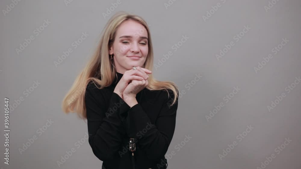 Hugging herself to warm while feeling cold arms crossed fear expression on face loneliness and depression. Being terrified with unknown sound. Hugging herself to warm while feeling cold arms crossed fear expression on face loneliness and depression. Being terrified with unknown sound.
