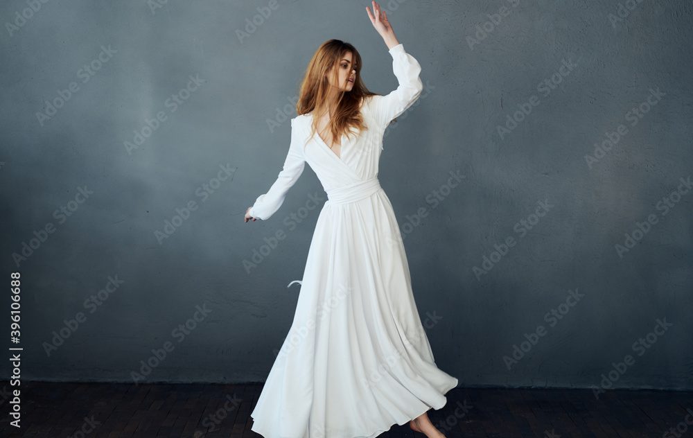 Woman in white wedding dress charm and luxury decoration dark background Woman in white wedding dress charm and luxury decoration dark background