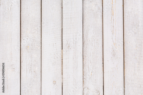 An old, grungy white background made of natural wood planks as a mockup