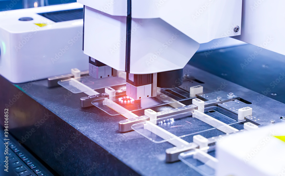 Robotic machine vision system in phone factory Robotic machine vision system in phone factory