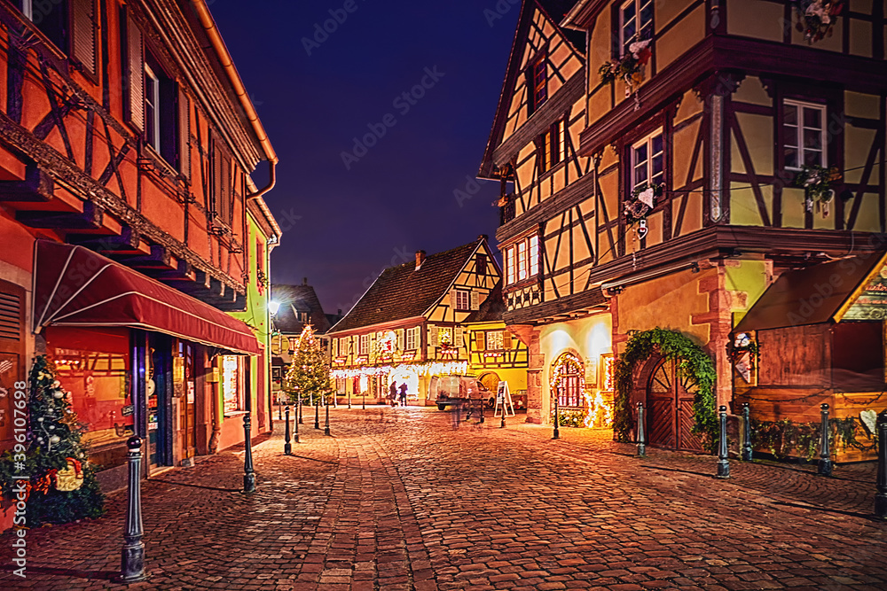 cozy street of Kaysersberg old village on Christmas holidas. Alsace, France