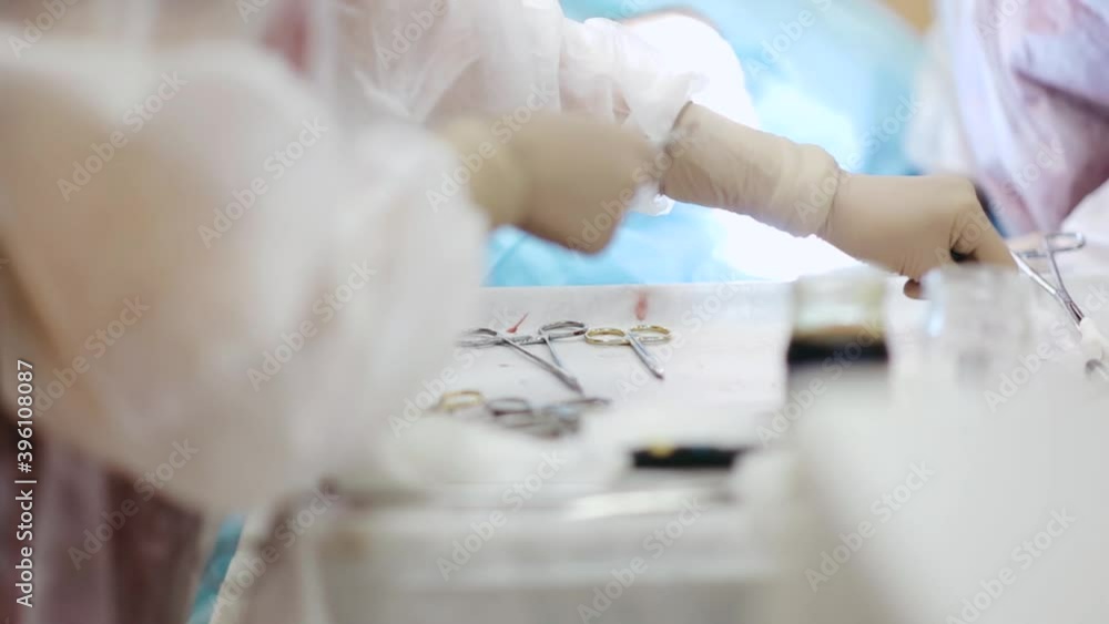 table with surgical instruments, the work of an assistant in a surgical operation.
table with surgical instruments, the work of an assistant in a surgical operation.
