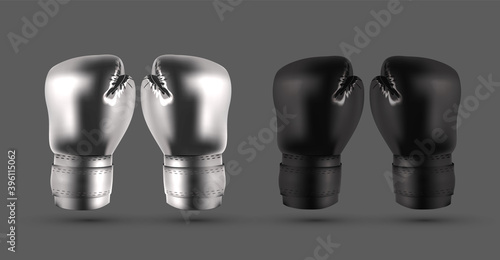 Silver and black boxing gloves isolated on gray abstract background realistic vector illustration