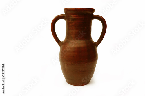 vintage clay jug on isolated white background