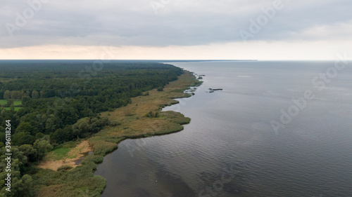 Trzebiez, Poland. Aerial view on coast of Zalew Szczecinski and forest. Drone photo 
