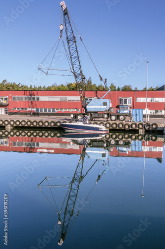 Blue crane for liftin boats out of the water photo