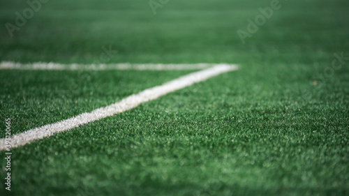 Football field green grass and white lines
