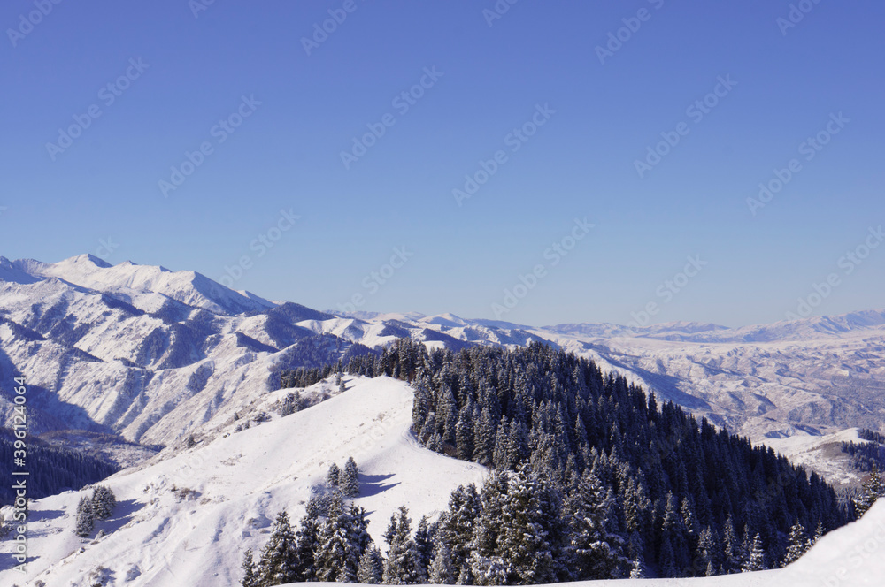 Beautiful alpine winter landscape. Snowy mountains. Highlands, mountains and gorges.
