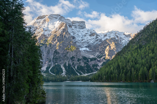 View of Mount Seekofel mirroring in the clear calm water of iconic mountain lake Pragser Wildsee (Lago di Braies) in Italy, Dolomites, Unesco World Heritage, South Tyrol