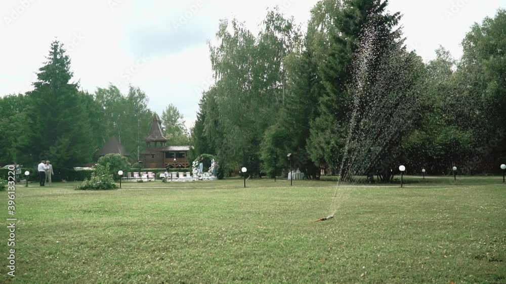 Lawn sprinkler in the summer Park Lawn sprinkler in the summer Park