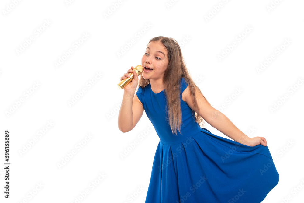 Attractive girl brunette sings song while holding microphone in hand, isolated Attractive girl brunette sings song while holding microphone in hand, isolated