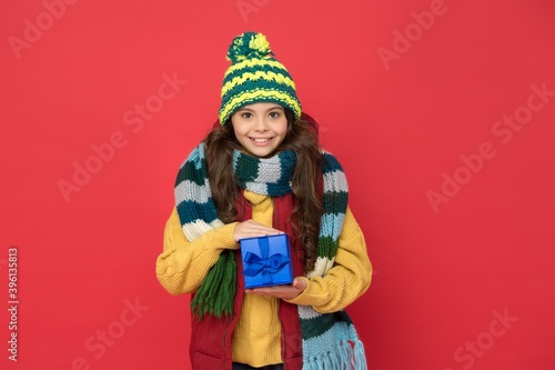 Thanks for your purchase. seasonal shopping sales. buy presents and gifts for christmas. happy childhood. teen girl hold box. knitted clothing style. new year holiday. child wear warm winter clothes
