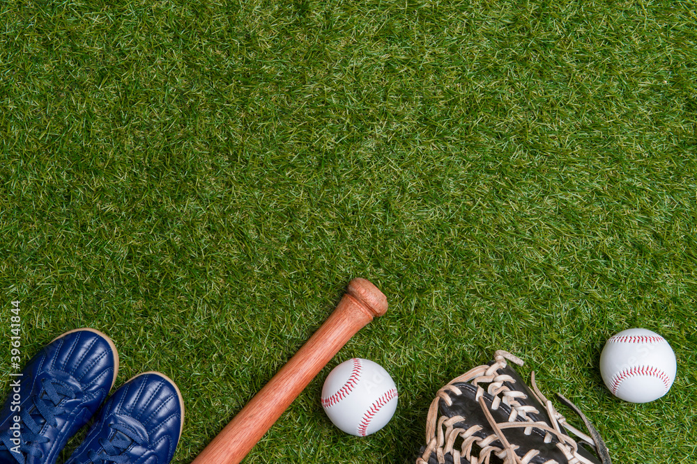 Baseball bat,shoes, glove and ball on green grass field. Sport theme  background with copy space for text and advertisment Stock Photo | Adobe  Stock