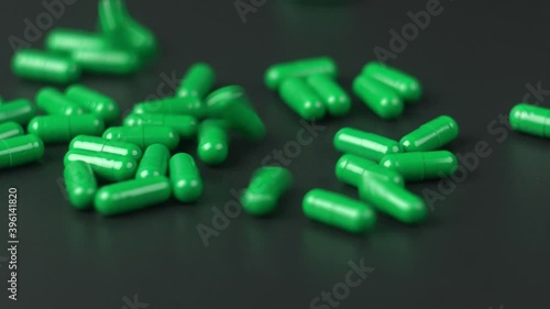 falling of green pills capsule 4k