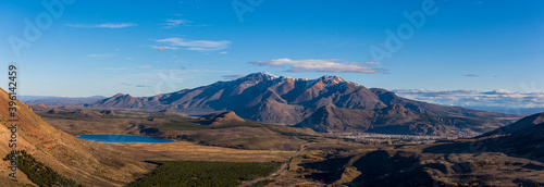 Panoramic of Esquel city surrounded by mountains and lakes during spring season, Patagonia, Argentina