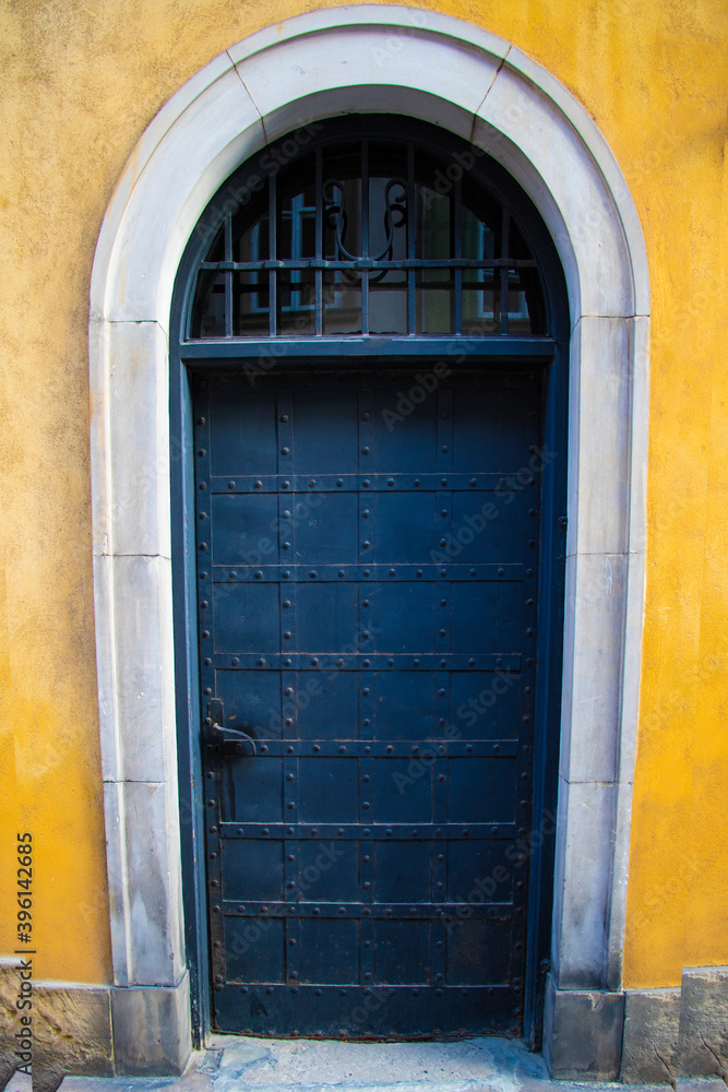 Old entrance door to the building, background. Old entrance door to the building, background.