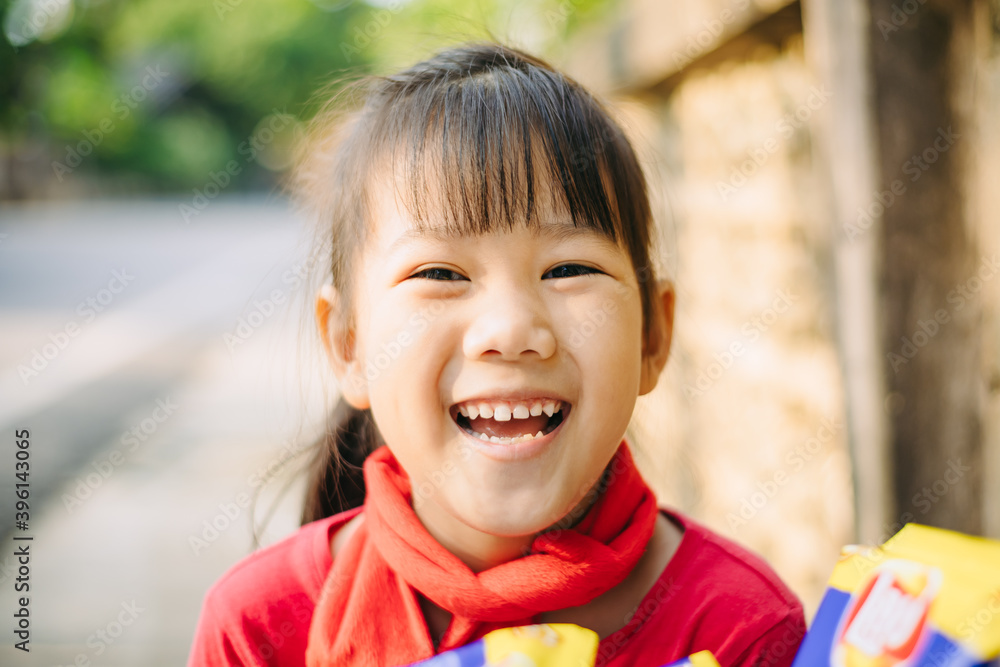 People portrait of an emotional expression face of smiling and laughing of 6 year old Asian kids. Healthy and happiness children concept. People portrait of an emotional expression face of smiling and laughing of 6 year old Asian kids. Healthy and happiness children concept.
