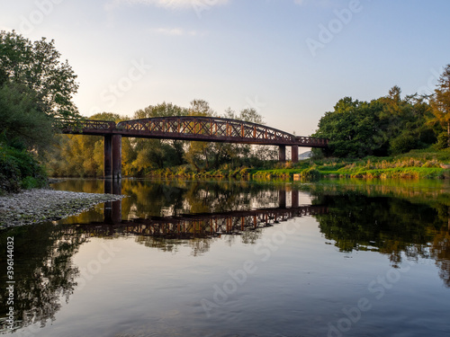 Monmouth Viaduct an old derelict railway viaduct bridge crossing the river Wye in Monmouthshire Wales.