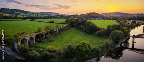 Monmouth Viaduct an old derelict railway viaduct bridge crossing the river Wye in Monmouthshire Wales. photo