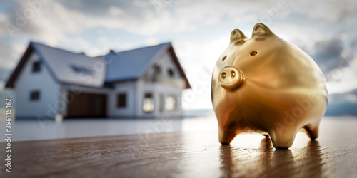 Piggybank and new house, saving for home, mortgage.