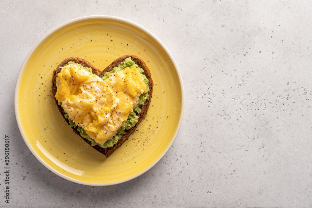 heart shaped healthy avocado toast with scrambled egg heart shaped healthy avocado toast with scrambled egg