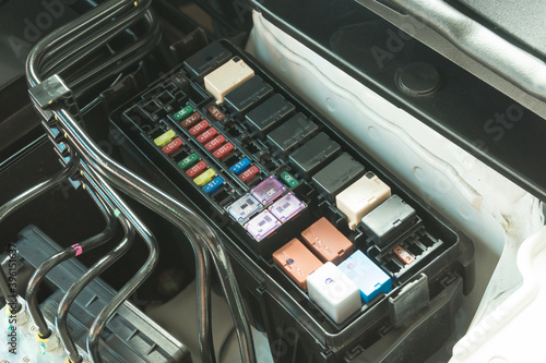 Close up of car fuse box, Car maintenance service.