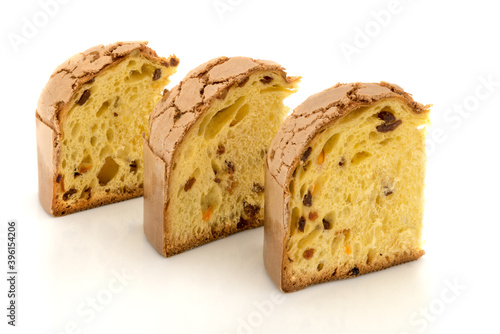 panettone, classic Christmas cake from Milan, three slices isolated on white
