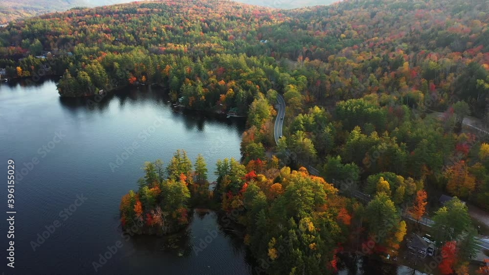Drone Aerial View of Coloful Forest on Scenic Lakefront in American Countryside on Autumn Afternoon, Vermont USA, Drone Shot Drone Aerial View of Coloful Forest on Scenic Lakefront in American Countryside on Autumn Afternoon, Vermont USA, Drone Shot
