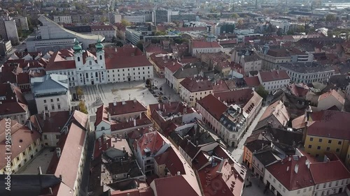 Aerial / drone footage of Szechenyi Square in downtown Győr, capital of Győr-Moson-Sopron County, Western Transdanubia region in Norhwestern Hungary photo