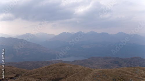 Scenic misty view of mountains in Scotland Loch Lomond