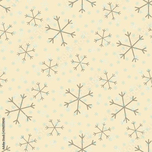 Seamless Christmas pattern doodle with hand random drawn snowflakes.Wrapping paper for presents  funny textile fabric print  design decor  food wrap  backgrounds. new year.Raster copy.Beige gray