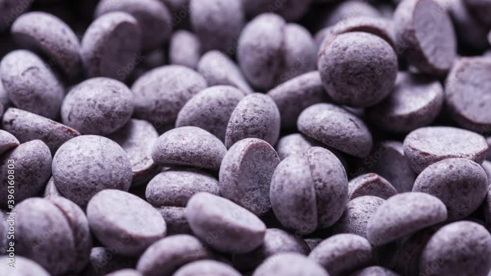 Animated stop motion texture Chocolate chips, morsels, small chunks ingredient of desserts Animated stop motion texture Chocolate chips, morsels, small chunks ingredient of desserts