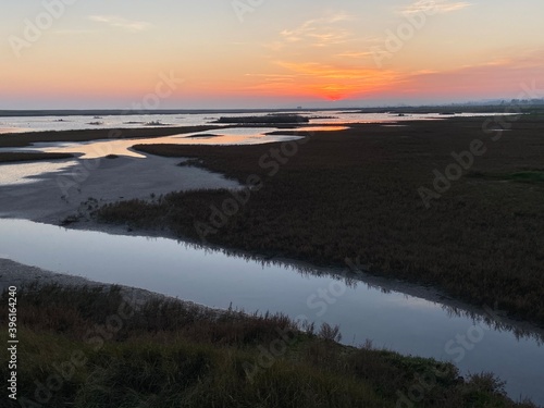 Rye Harbour  Nature reserve  East Sussex UK - 28.11.2020  Rye Harbour landscape view at low tide harbour wetlands popular with bird watchers at sunset