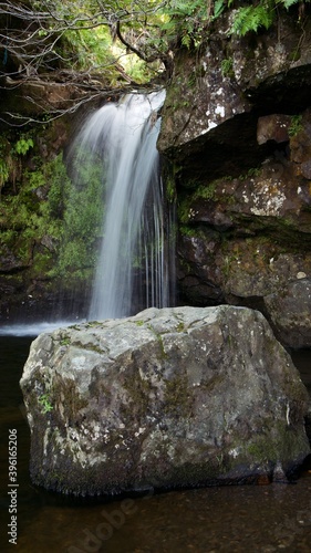 Small Scottish waterfall with a big boulder in the Campsie Fells © Jitka