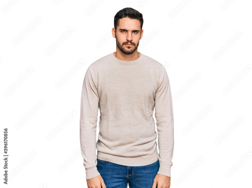 Young hispanic man wearing casual clothes skeptic and nervous, frowning upset because of problem. negative person. Young hispanic man wearing casual clothes skeptic and nervous, frowning upset because of problem. negative person.