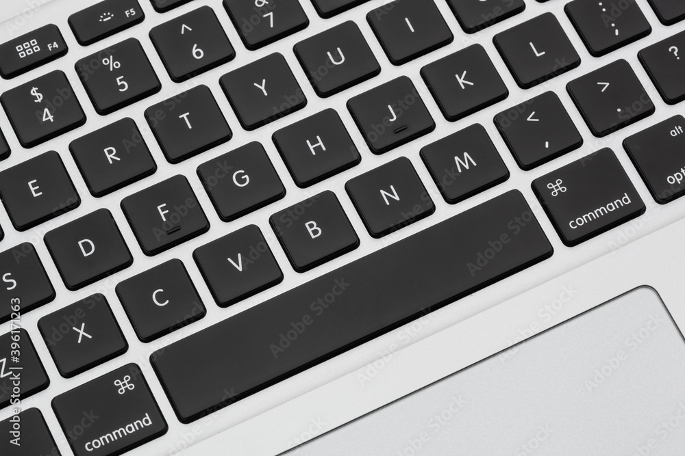 new silver color keyboard of the laptop close up new silver color keyboard of the laptop close up