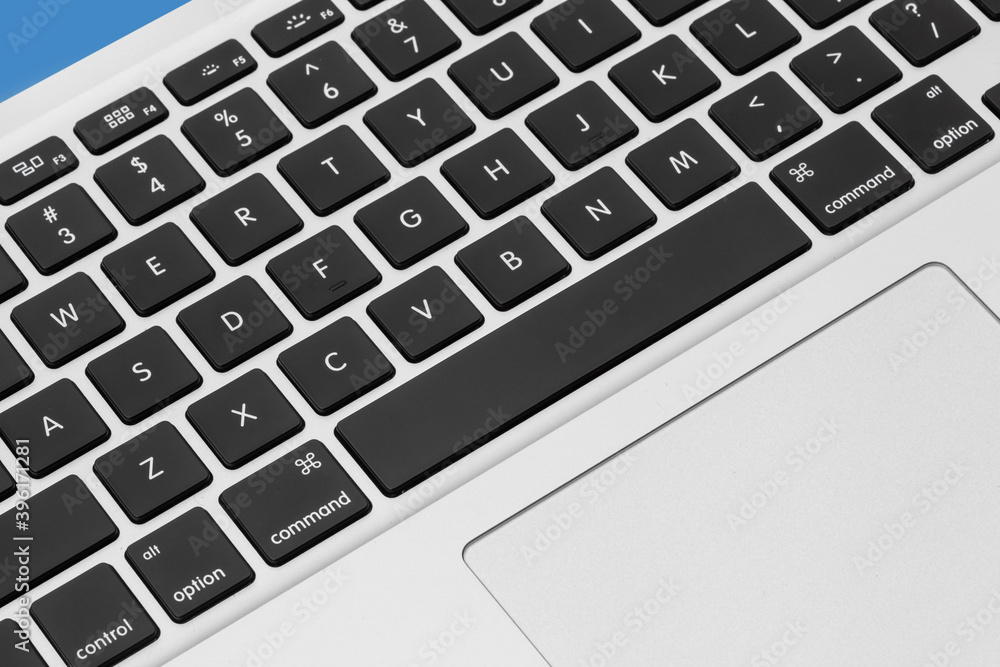 new silver color keyboard of the laptop close up new silver color keyboard of the laptop close up