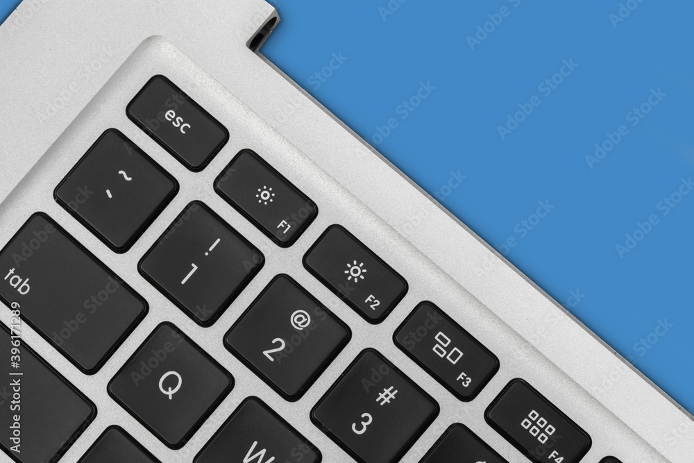 new silver color keyboard of the laptop close up new silver color keyboard of the laptop close up