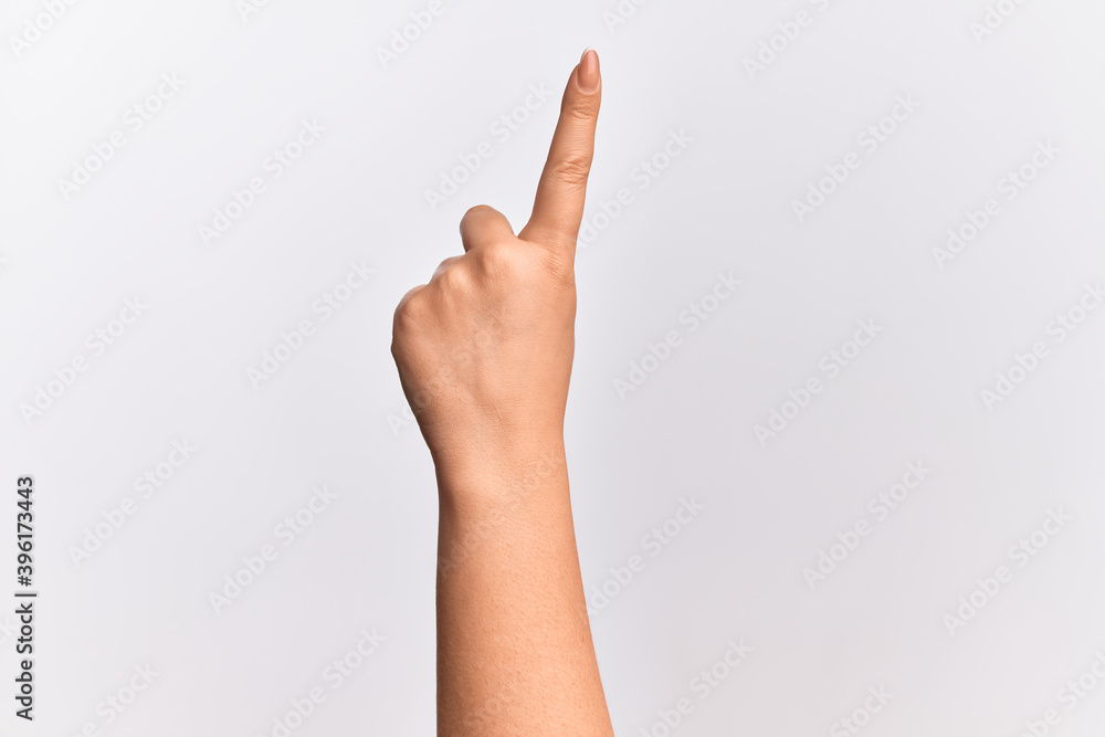 Hand of caucasian young woman counting number one using index finger, showing idea and understanding Hand of caucasian young woman counting number one using index finger, showing idea and understanding