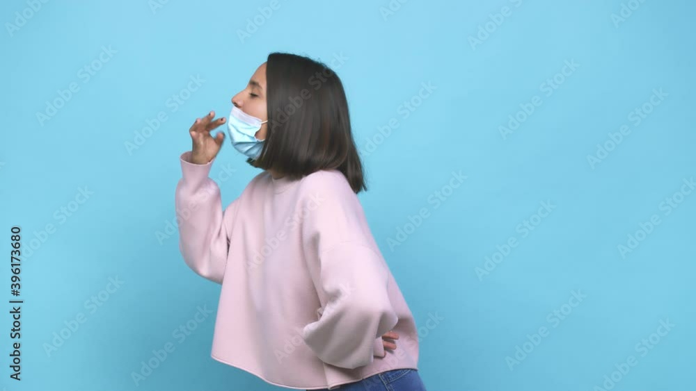 Young hispanic woman wearing antiviral mask forgetting something, slapping forehead with palm and closing eyes Young hispanic woman wearing antiviral mask forgetting something, slapping forehead with palm and closing eyes