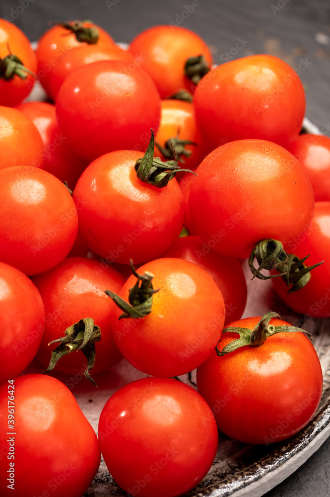 Small red ripe Sweet Enjoy cherry vine tomatoes, Rivolo variety