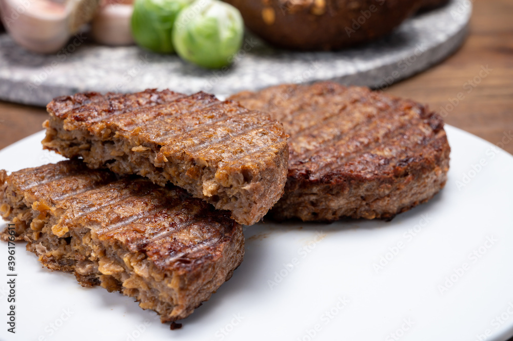 Grilled plant based, meat free vega burgers close up Grilled plant based, meat free vega burgers close up