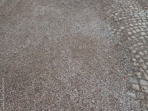 pedestrian sidewalk with cobbles being repaired photo