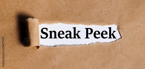 sneak peek preview. text on white paper on torn paper background